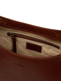 Conkca brown Vivienne leather grab bag with brass fittings, imported from the UK