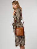 Conkca multi-toned brown leather shoulder bag with adjustable strap, UK version