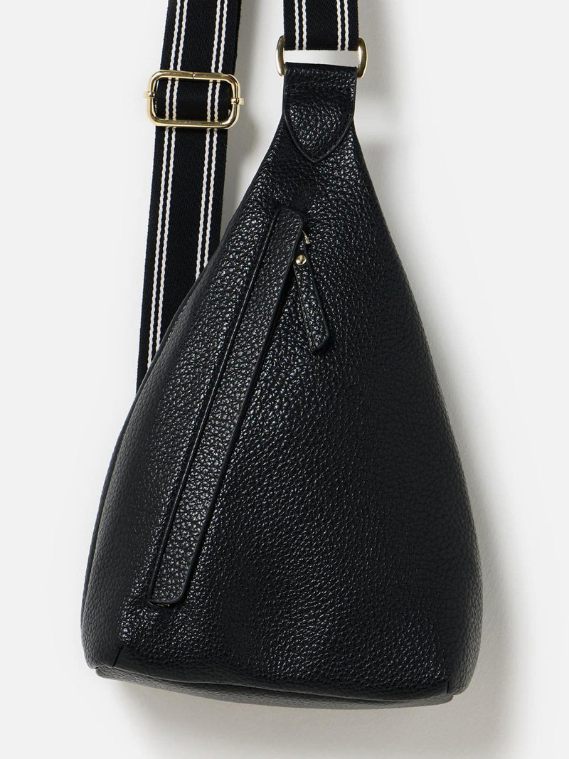 Oliver Bonas black belt bag with gold hardware, imported from the UK