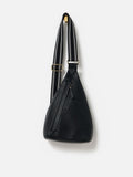 Oliver Bonas black belt bag with gold hardware, imported from the UK