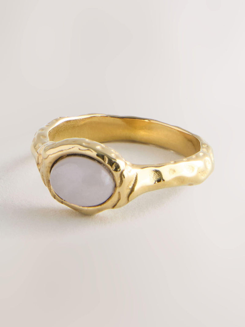 Gold tone hammered ring with pink semi precious stone - British product