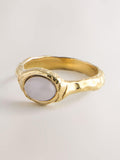 Gold tone hammered ring with pink semi precious stone - British product