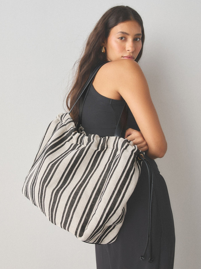 Black and white stripe drawstring shoulder bag, imported from the UK