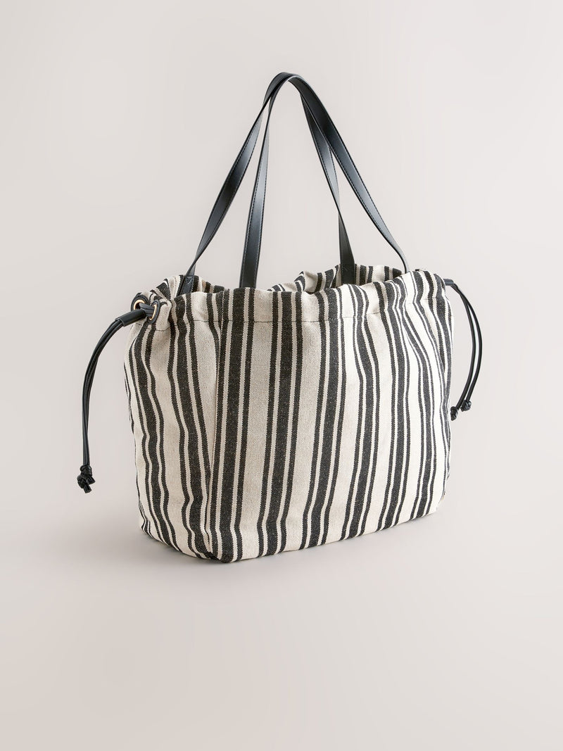 Black and white stripe drawstring shoulder bag, imported from the UK