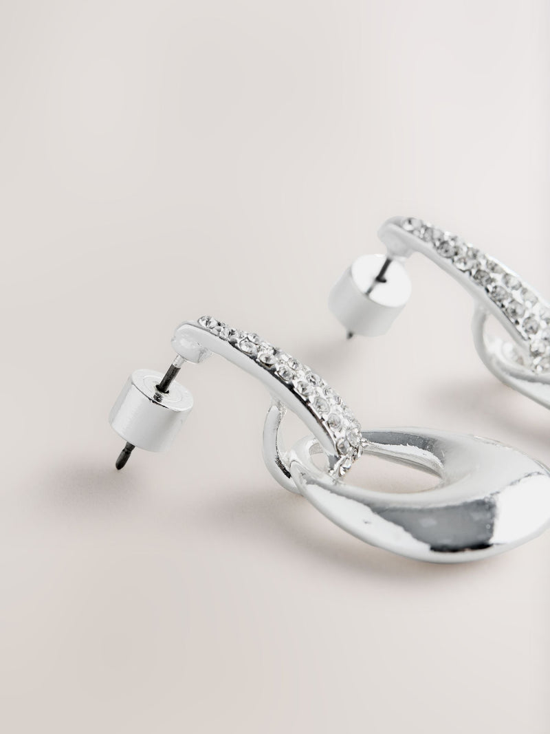 Silver-tone drop pendant earrings with diamond detailing, UK version
