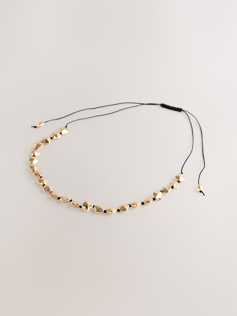 Gold tone chunky beaded cord adjustable necklace, UK version