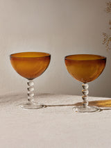 Next Nkuku Set of 4 Amber Thimma Champagne Coupe Glasses- Buy online at McGrocer