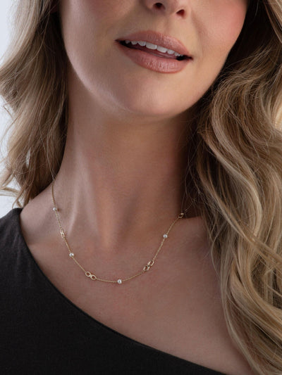 Next Beaverbrooks 9ct Yellow Gold Freshwater Cultured Pearl Infinity Necklace 46cm- Buy online at McGrocer