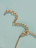 Tabitha Simmons gold tone layered charm necklace, imported from the UK