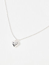 Next Oliver Bonas Silver Plated Cora Engraved Heart Charm Pendant Necklace- Buy online at McGrocer