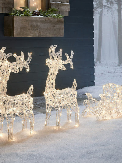 Next Lights4fun Clear 70cm Swinsty LED Light Up Reindeer and Sleigh Outdoor Christmas Decoration- Buy online at McGrocer