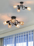 Searchlight amber and black three-light ceiling lamp, imported from the UK