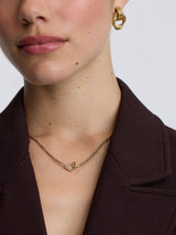 Next D.LOUISE Gold Tone Waterproof Knot Chain Necklace- Buy online at McGrocer