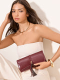 Lipsy burgundy red tassel trim clutch bag, UK version