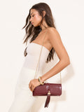 Lipsy burgundy red tassel trim clutch bag, UK version