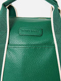 Oliver Bonas green slouch backpack with gold hardware (British brand)