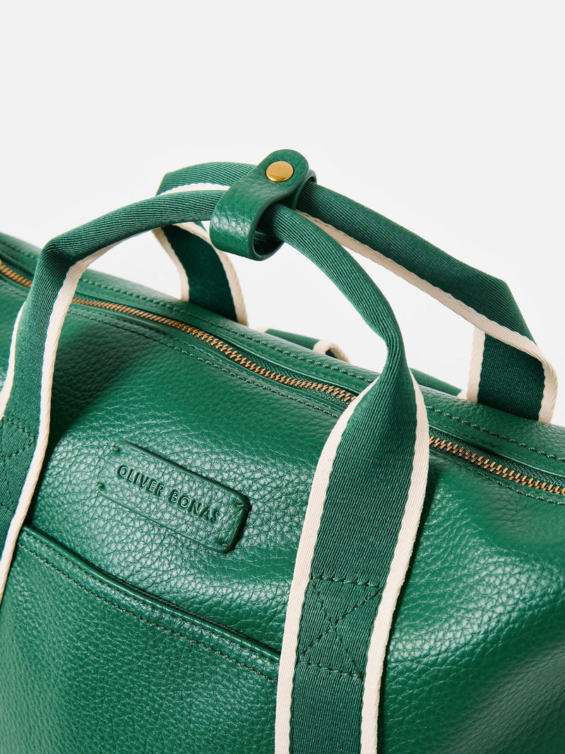 Oliver Bonas green slouch backpack with gold hardware (British brand)