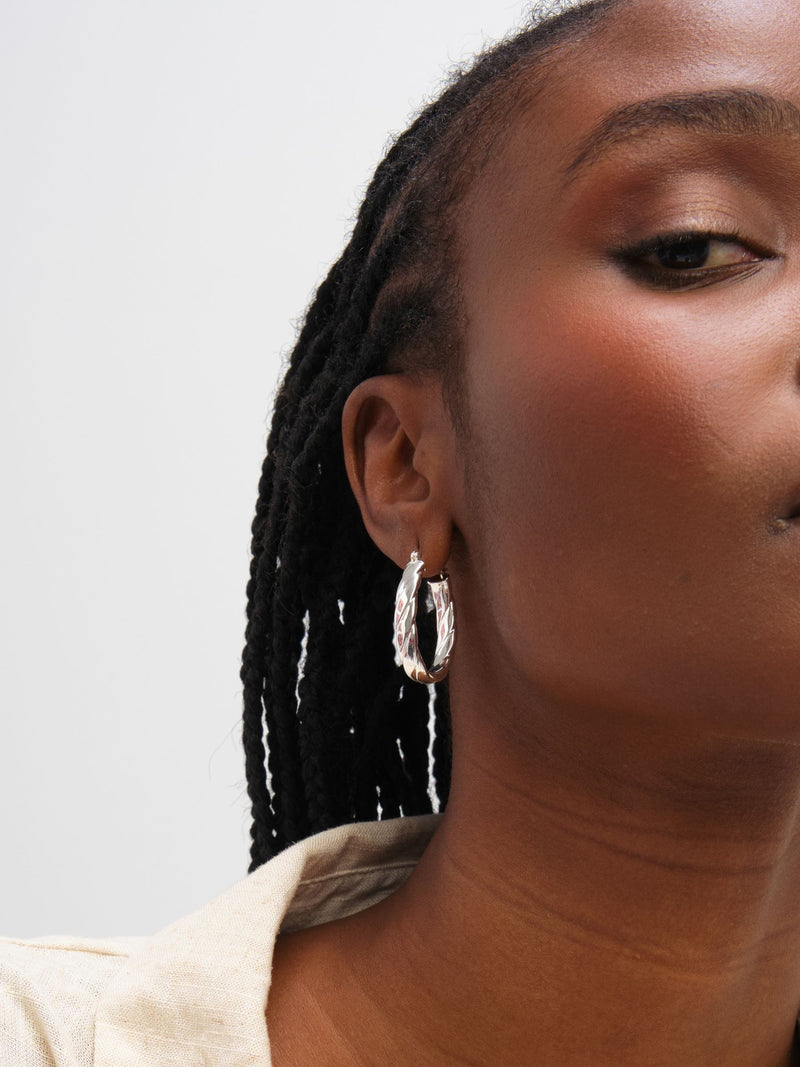 Inicio sterling silver plated oval hoop earrings 25mm, imported from the UK