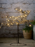 Lights4fun Brown Rattan Light Up Leaping Bunny, imported from the UK