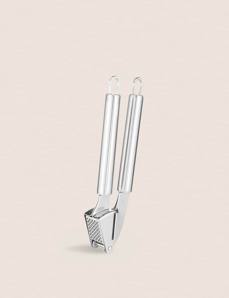 Stainless steel garlic press kitchen utensil, UK version