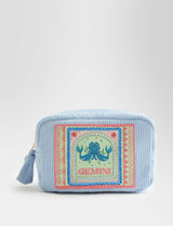 Trousse de toilette brodée avec le signe astrologique des Gémeaux