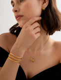 Katie Loxton gold plated bangle open cuff waterproof, imported from the UK