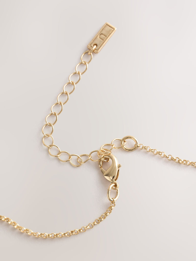 Gold tone pearl effect pendant necklace (British brand)