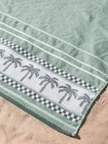 Catherine Lansfield extra large green palm beach towel, imported from the UK