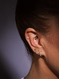 Aela gold tone cubic zirconia piercing huggie hoop earrings - British product