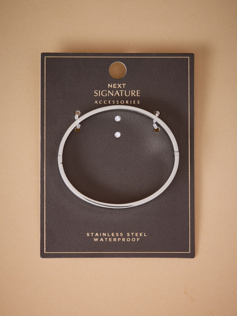 Stainless steel bangle (British brand)