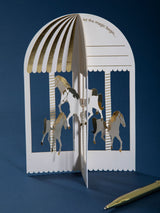 Next Hallmark White Gold 3D Carousel Pop-Up Greeting Card - Paper Fables- Buy online at McGrocer