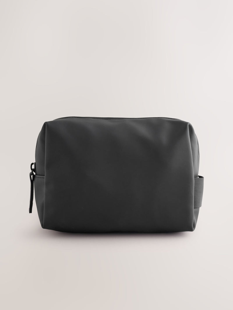 Black rubberised washbag with water-resistant finish, UK version