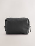 Black rubberised washbag with water-resistant finish, UK version