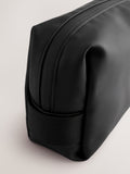 Black rubberised washbag with water-resistant finish, UK version