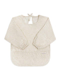 Avery Row sleeved bib in Daisy Meadow pattern (British brand)
