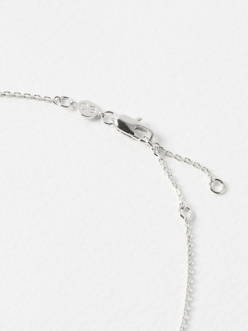 Oliver Bonas sterling silver sun charm pendant necklace, UK version