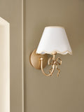 Brass Bow rechargeable wall light with fabric shade, imported from the UK