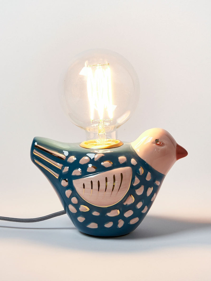 Oliver Bonas blue Ovie bird ceramic lamp, imported from the UK