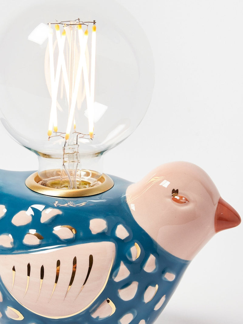 Oliver Bonas blue Ovie bird ceramic lamp, imported from the UK