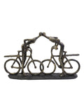 Libra Interiors bronze smooching cyclist sculpture, 28cm height, UK version