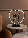 Libra Interiors bronze lovers on branch LED light sculpture 32cm, UK version