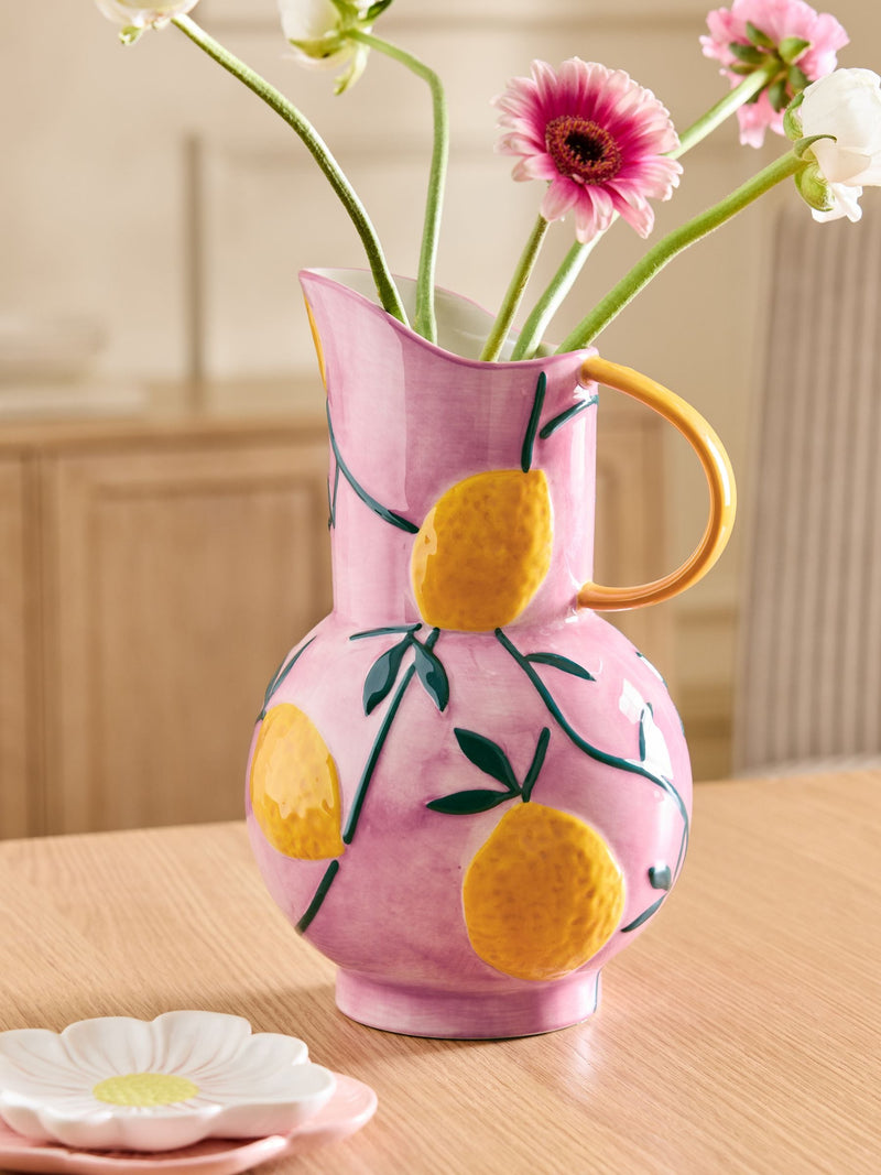 Ceramic jug vase with purple glaze and lemon details, imported from the UK