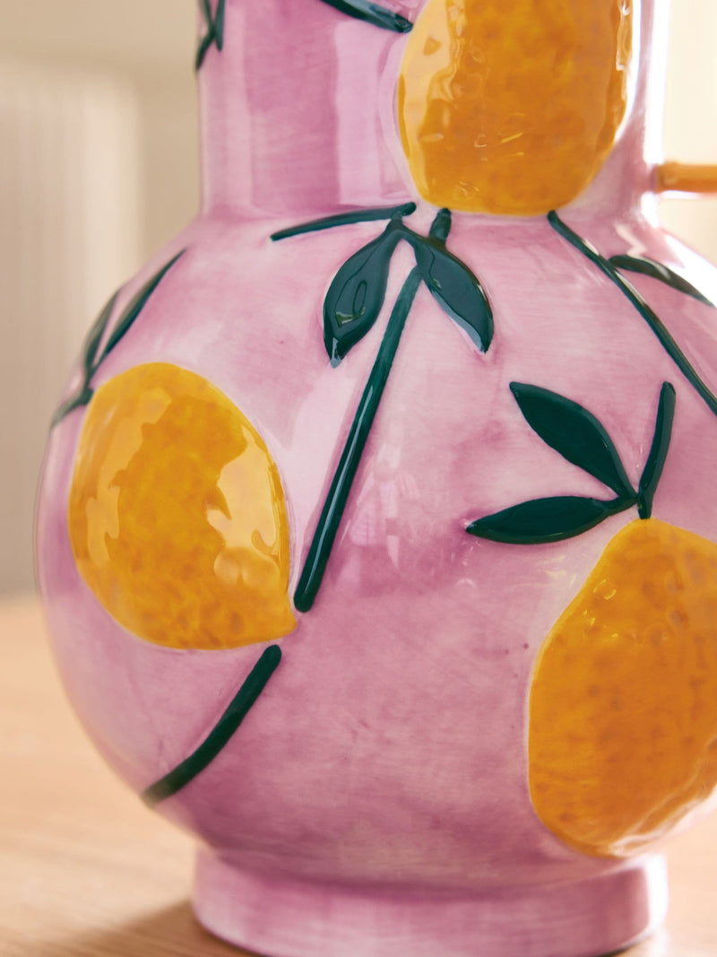 Ceramic jug vase with purple glaze and lemon details, imported from the UK