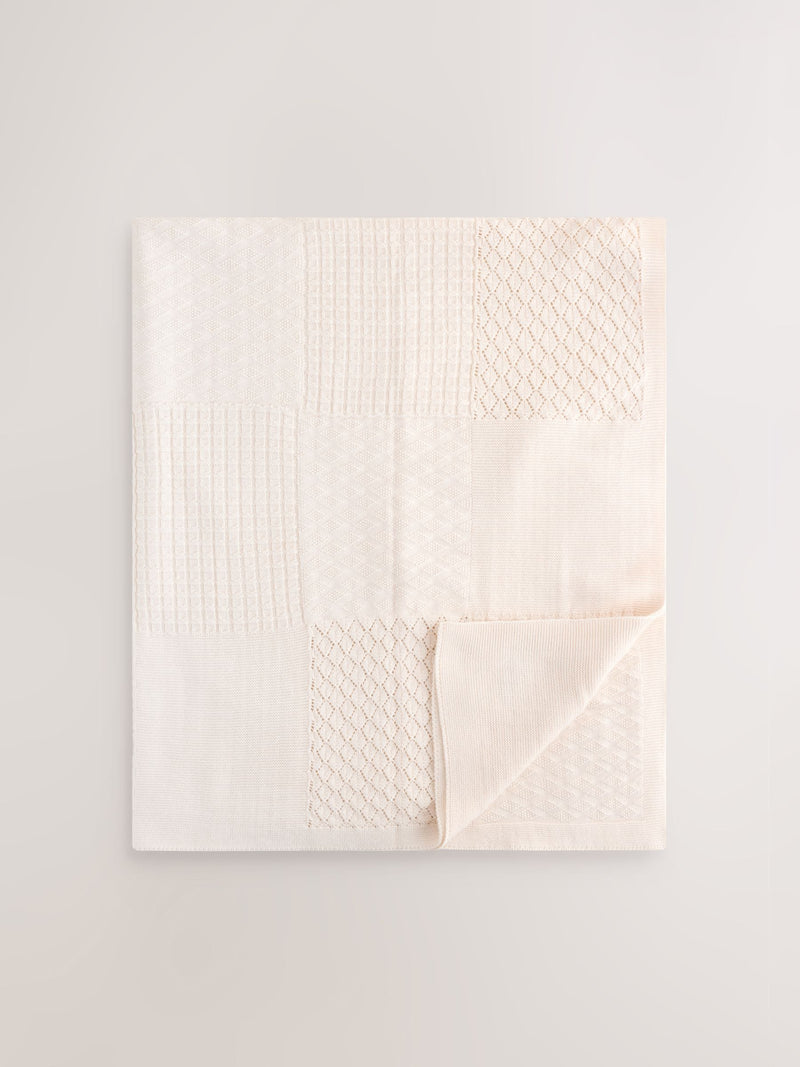 Cream knitted patchwork baby blanket - British product