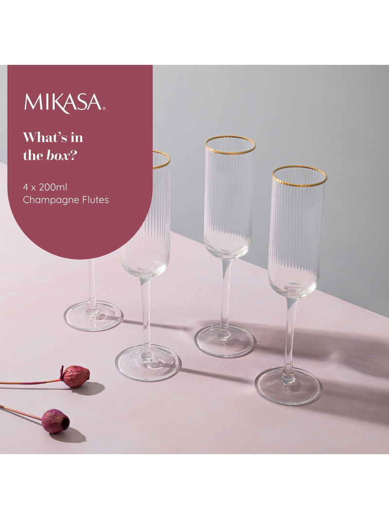Mikasa gold champagne flutes set of 4, imported from the UK