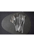 Mikasa black pebble-shaped faux leather placemat set of 4, imported from the UK