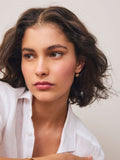 Brushed gold tone heart pierced earrings - British product