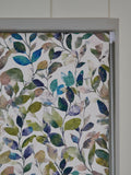 Multicoloured leaf print blackout roller blind, imported from the UK