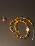 Anni Lu gold tone necklace, UK version