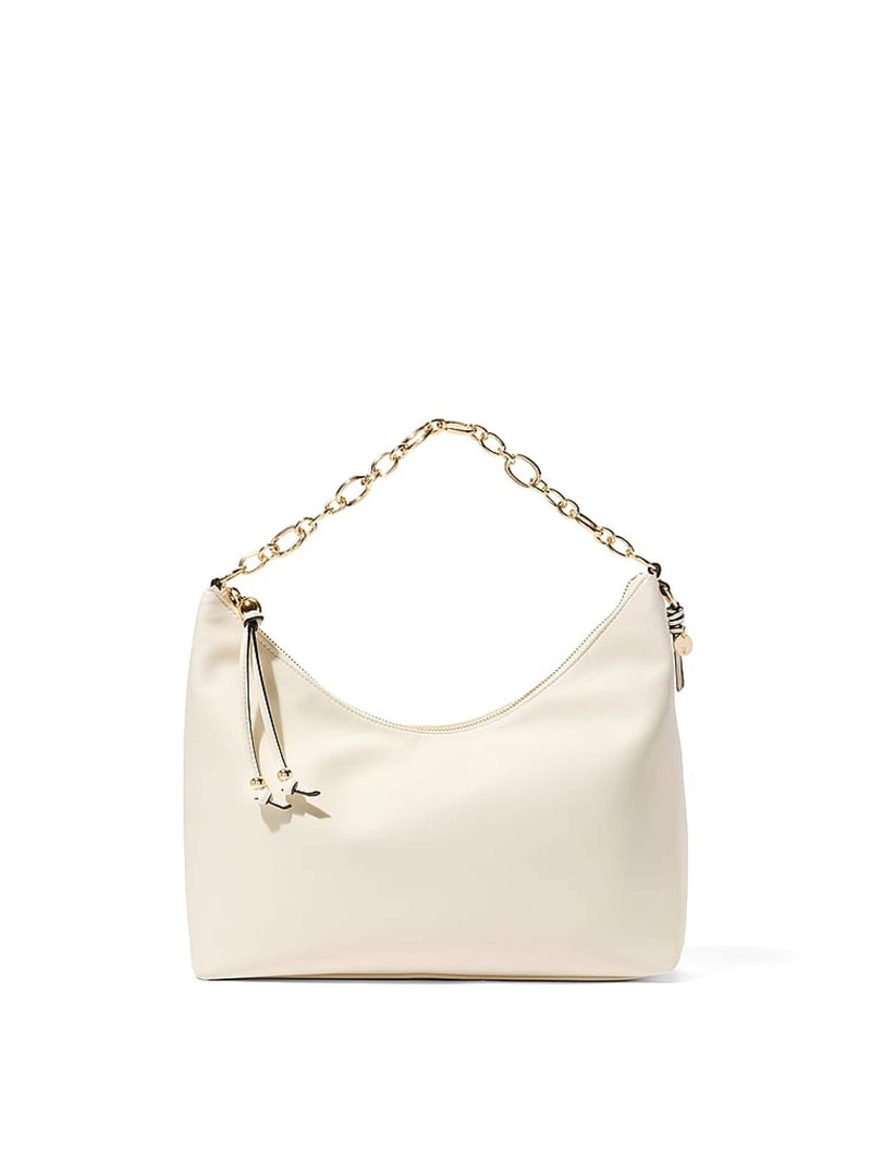 Victoria's Secret cream medium hobo bag with swan studs, imported from the UK